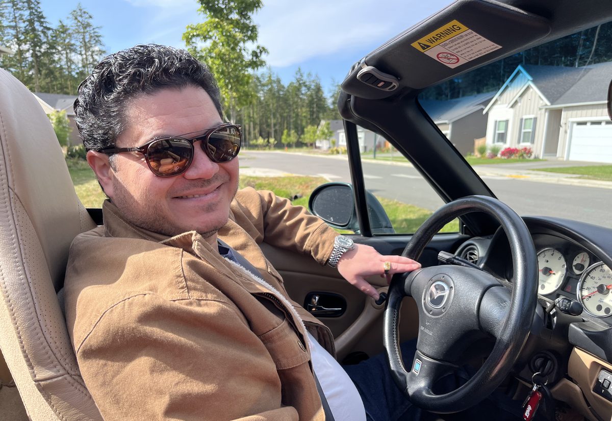 Anthony in his convertible